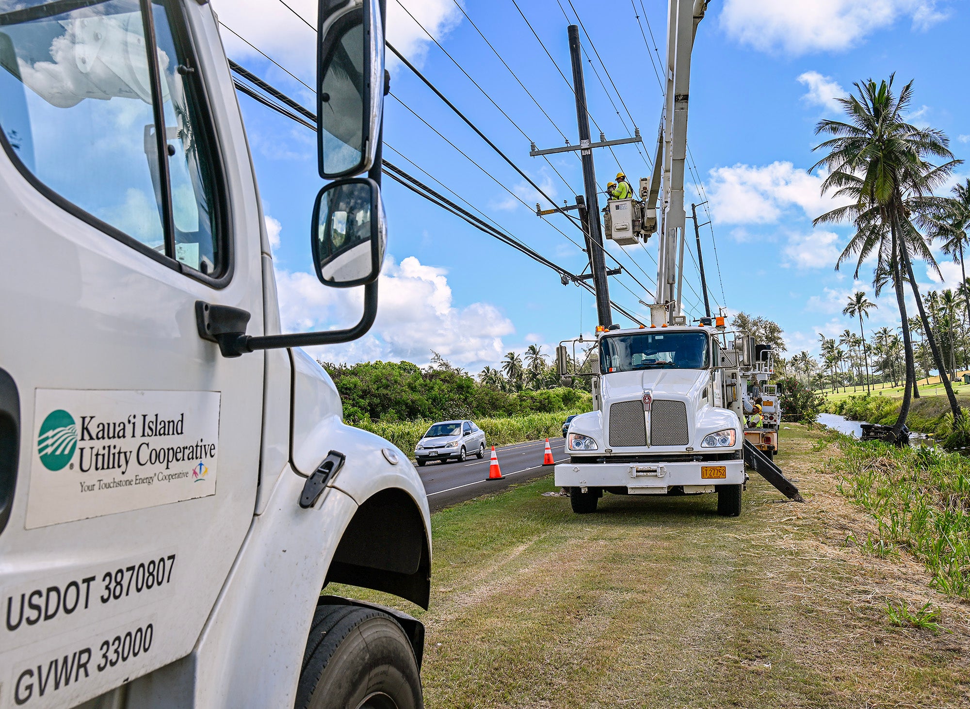 KIUC line crews work in the field