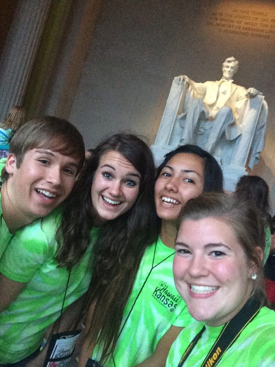 4 students smiling